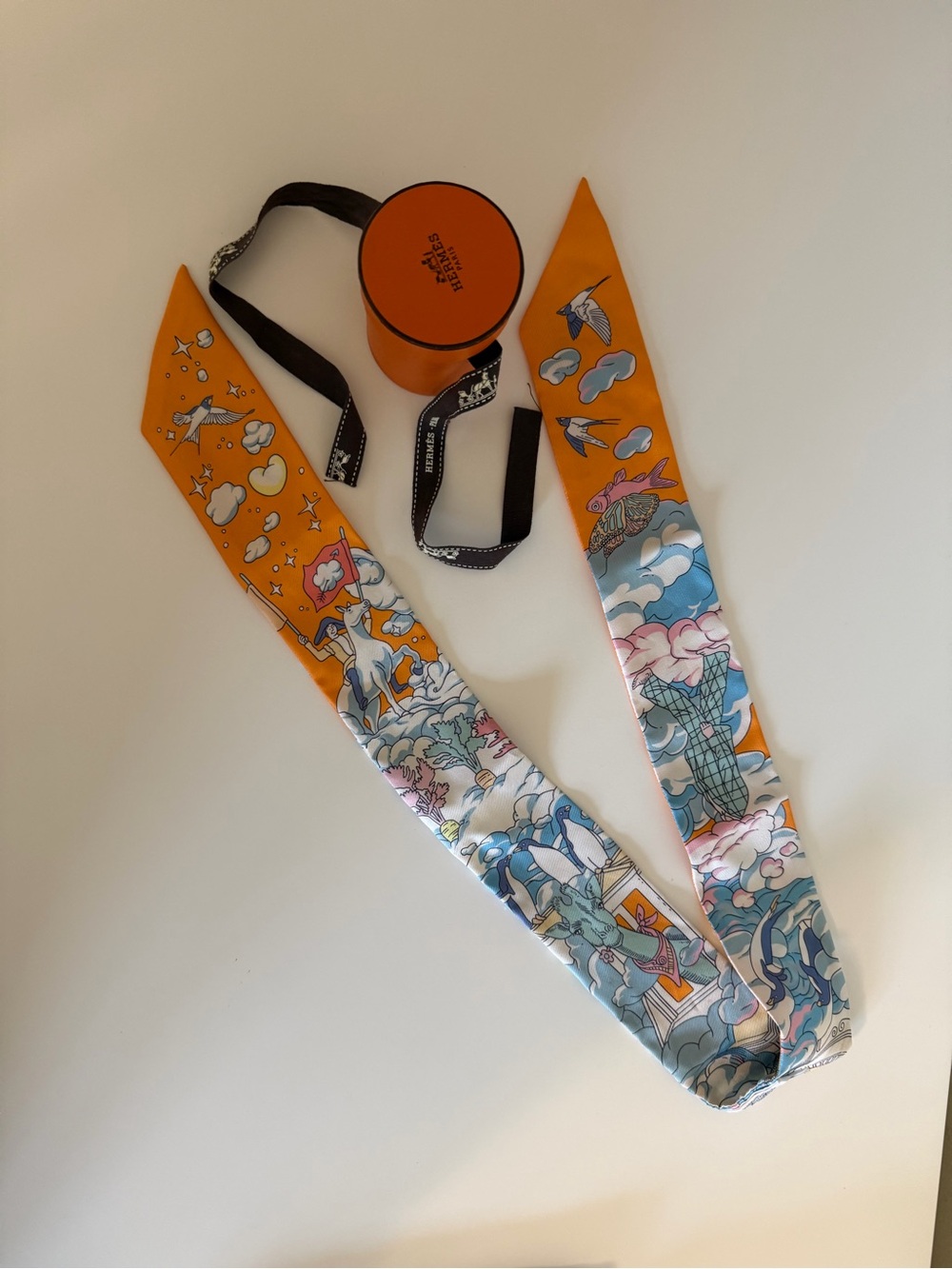Hermes Silk Twilly Scarf in Orange with Multicolor Print